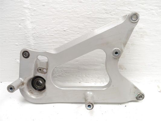 SYM JET X 125 2021-2023 EXHAUST REAR WHEEL BRACKET